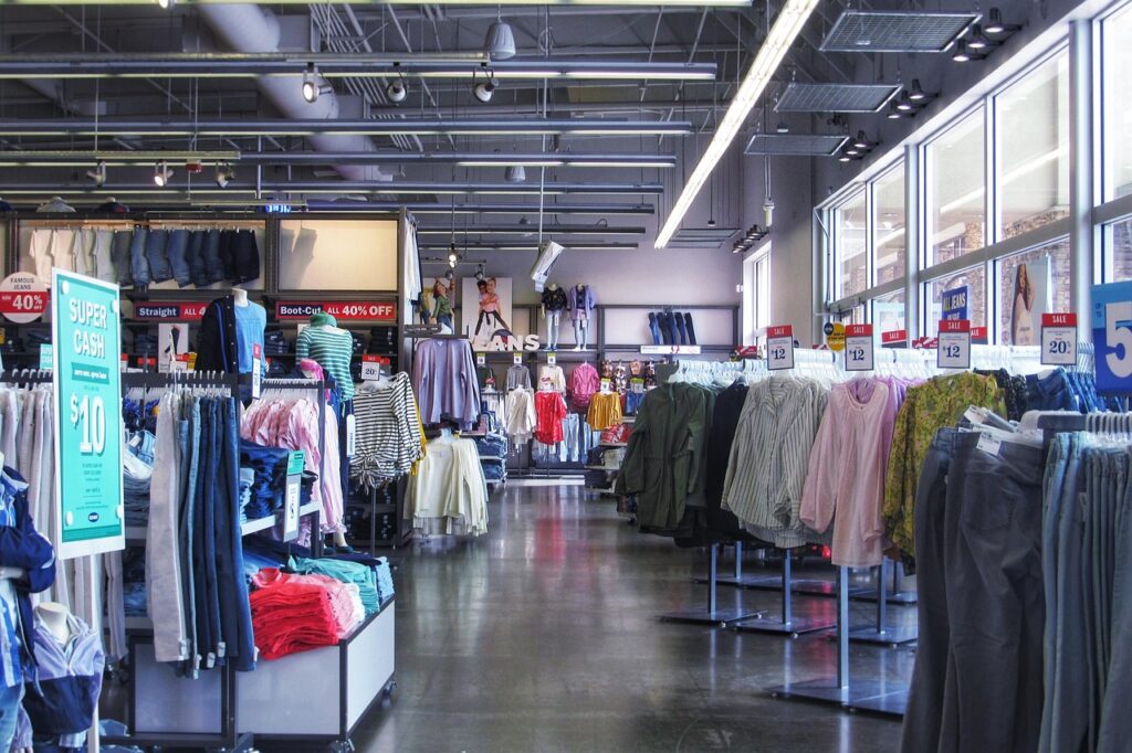 Clothing store interior with racks of clothes