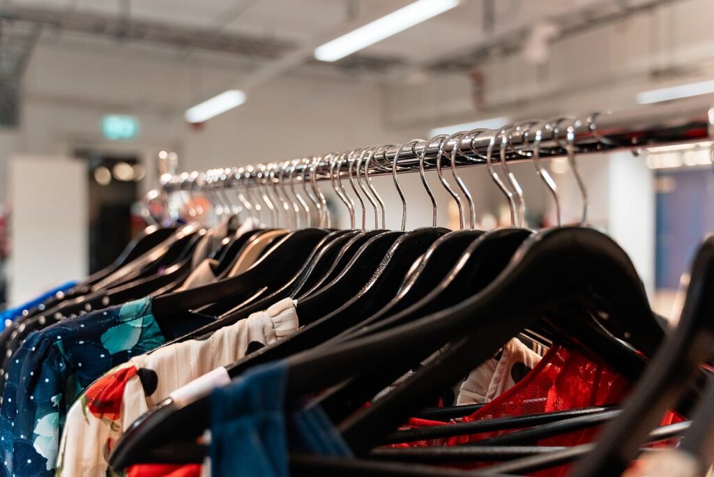 Clothes on a hanger in a wardrobe